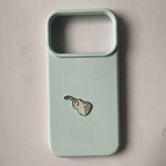 Pinkgul.no decorative metal guitar sticker applied to a light blue smartphone case
