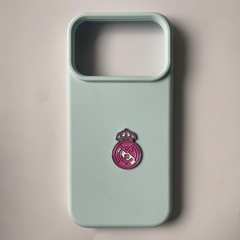 Pinkgul.no decorative pink and silver metal Real Madrid logo sticker applied to a light blue phone case