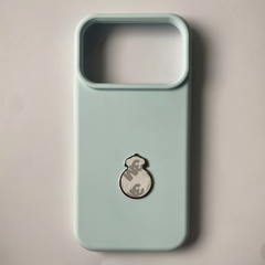 Pinkgul.no decorative metal sticker with adhesive backing applied to a light blue smartphone case