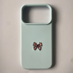 Pinkgul.no light blue phone case featuring a decorative metallic pink bow sticker with a dollar bill pattern