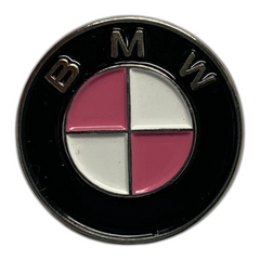 Pinkgul.no decorative metal sticker featuring a circular BMW logo design with pink and white accents.