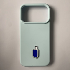 Pinkgul.no decorative metal suitcase sticker applied to a light blue smartphone case