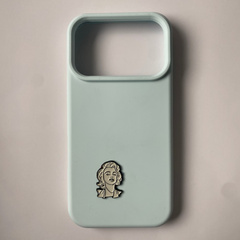 Pinkgul.no light blue phone case with a decorative metallic Marilyn Monroe sticker attached to the back