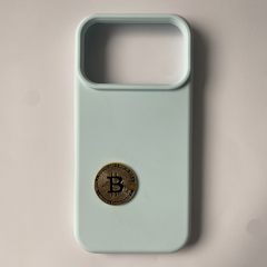 Pinkgul.no decorative gold Bitcoin metal sticker applied to a light blue smartphone case