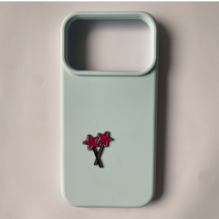 Pinkgul.no decorative metal sticker featuring two crossed pink star wands on a light blue phone case