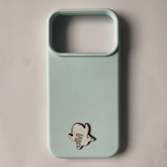 Pinkgul.no decorative ghost-shaped metal sticker applied to a light blue smartphone case