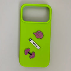 Pinkgul.no Anna decorative metal sticker set featuring a pink cap, name tag, and dumbbell on a lime green phone case