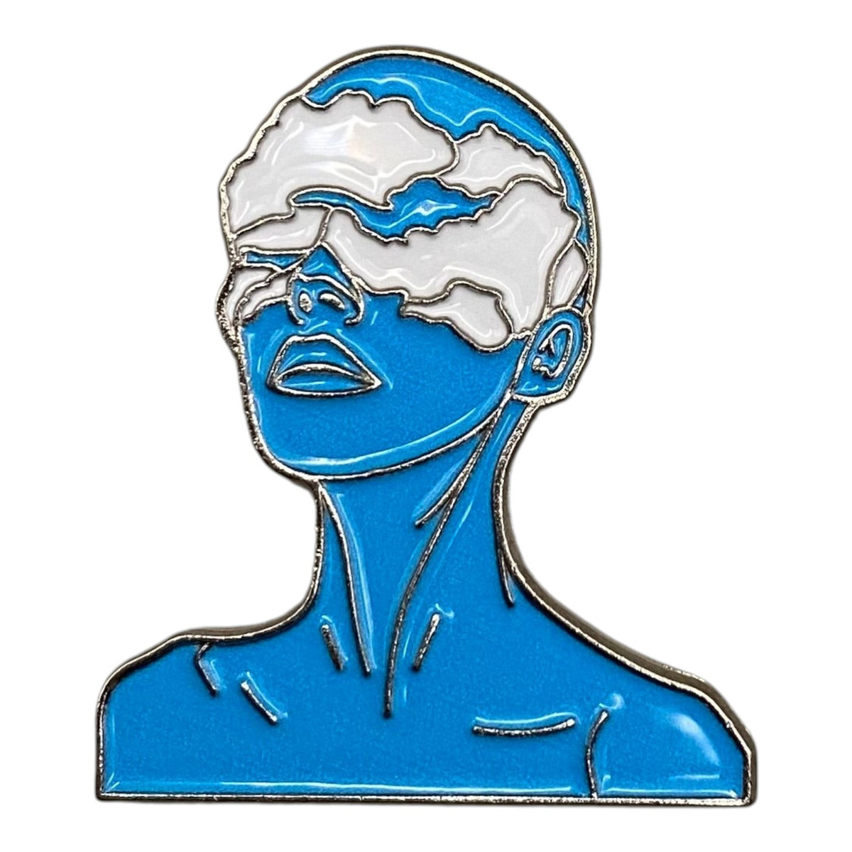 Pinkgul.no decorative metal sticker featuring a blue silhouette of a person with white clouds covering their eyes.