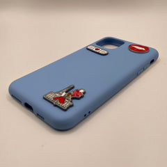 Pinkgul.no light blue phone case decorated with raised metal stickers including an Eiffel Tower and red heart