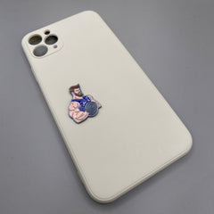 Pinkgul.no decorative metal sticker featuring a muscular bodybuilder with a dumbbell on a white phone case