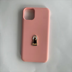 Pinkgul.no decorative metal sticker featuring a traditional Norwegian bunad design on a soft pink phone case.