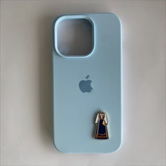 Pinkgul.no decorative metal sticker featuring a traditional Norwegian bunad design on a light blue phone case