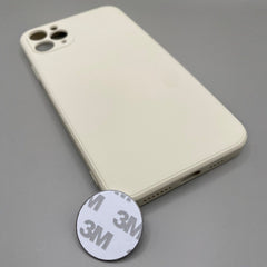 Pinkgul.no decorative round metal sticker with strong 3M adhesive backing, shown next to a beige smartphone