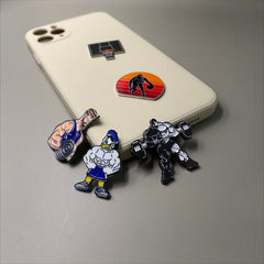 Pinkgul.no decorative metal stickers featuring gym and sports themes applied to a beige smartphone case.