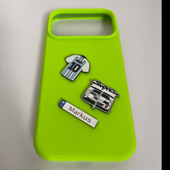 Pinkgul.no decorative metal stickers including a jersey, Supra car, and Markus name tag on a neon green phone case