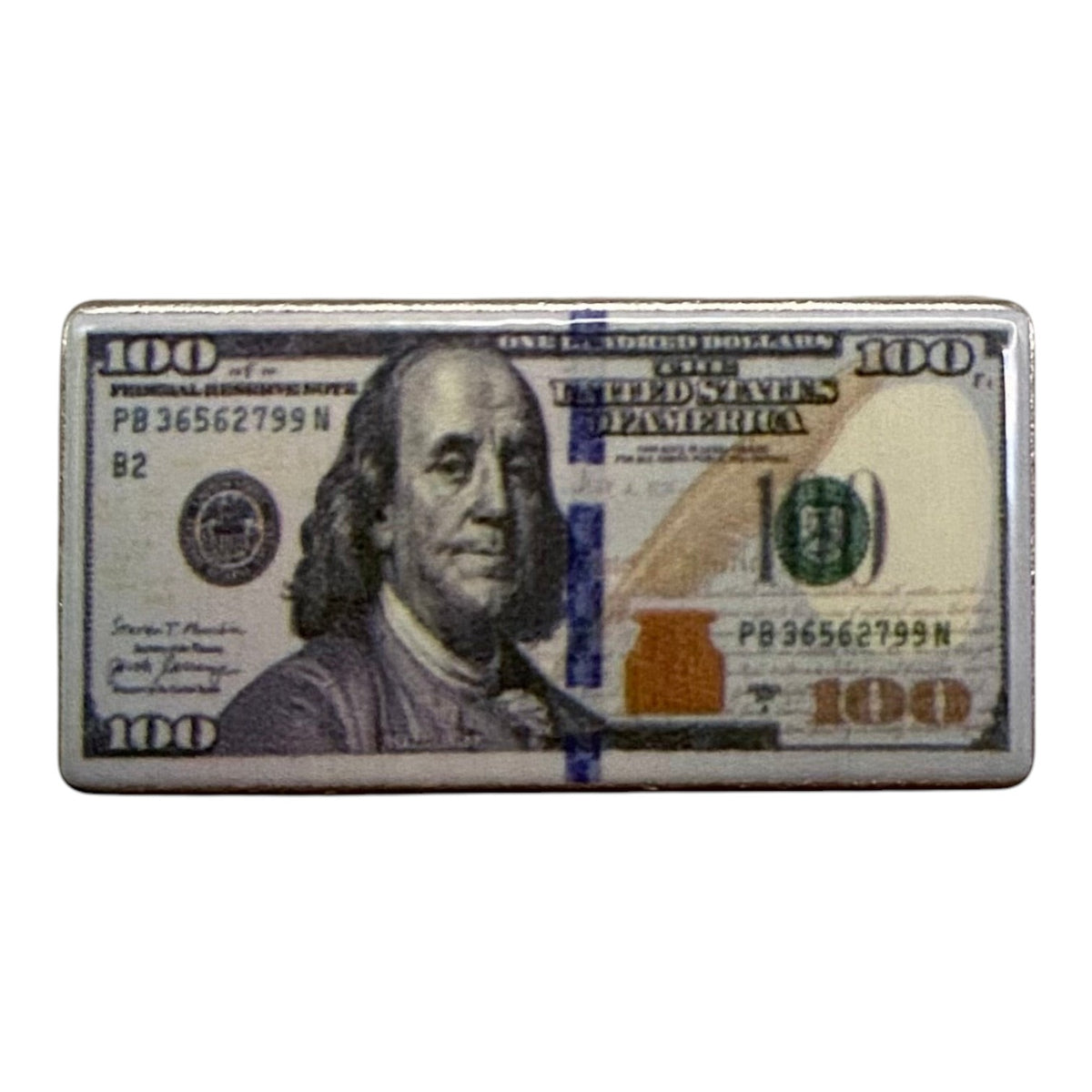 Pinkgul.no decorative metal sticker featuring a detailed 100 dollar bill design with a smooth, raised finish.