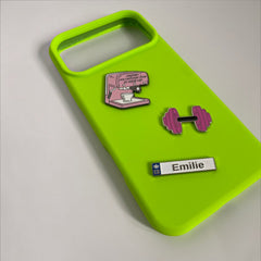 Pinkgul.no Emilie decorative metal sticker on a neon green phone case with coffee and dumbbell designs