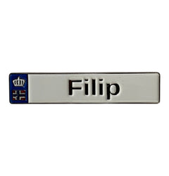 Pinkgul.no Filip decorative metal sticker with a white finish, raised black text, and a small crown emblem.