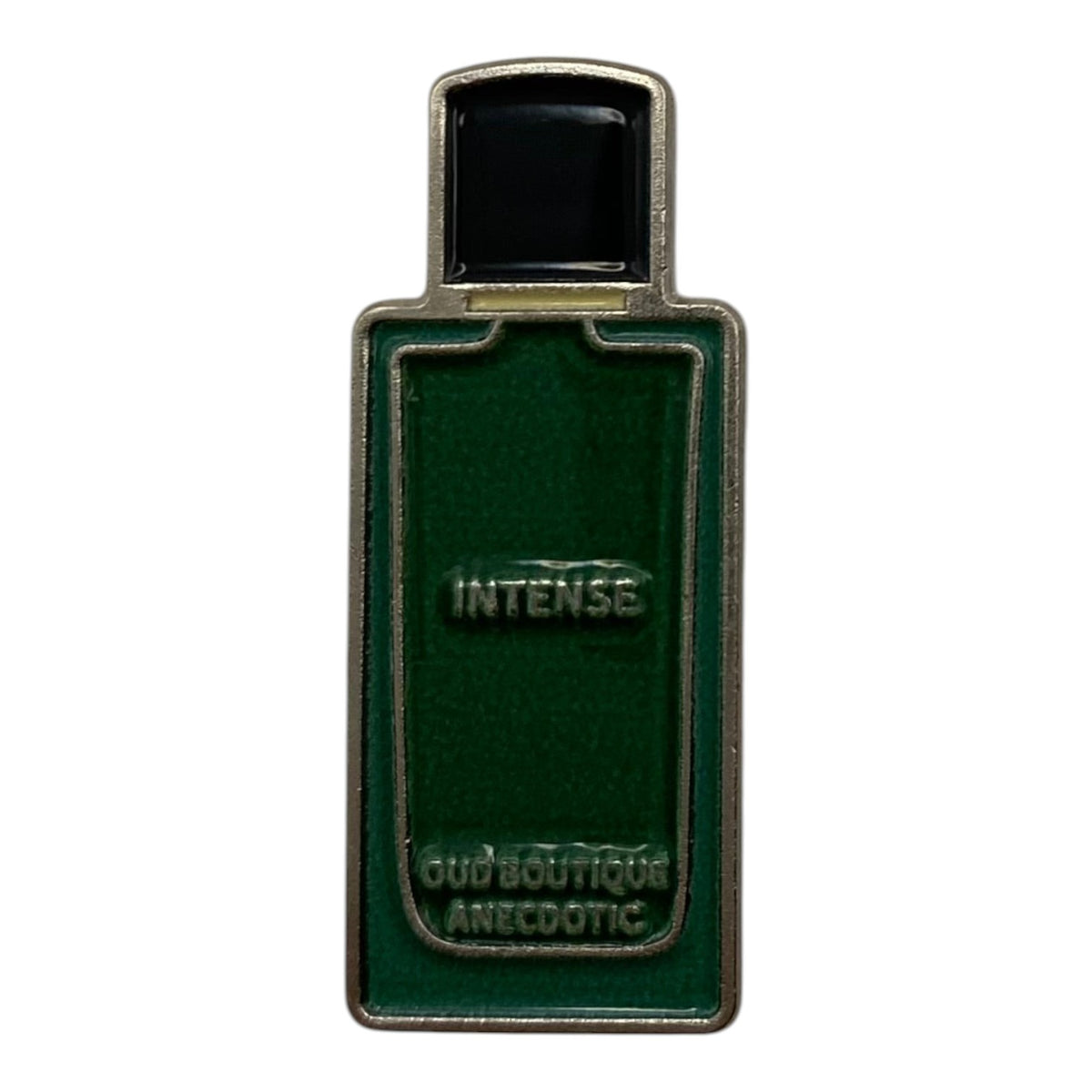 Pinkgul.no decorative metal sticker shaped like a green perfume bottle with raised Intense Oud Boutique Anecdotic text