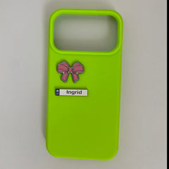 Pinkgul.no Ingrid decorative metal bow sticker applied to a bright lime green phone case