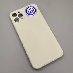 Pinkgul.no decorative metal sticker with Inter Milan logo applied to a beige smartphone case