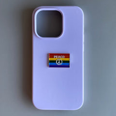 Pinkgul.no LGBT+ pride flag metal sticker with peace sign on a light purple phone case