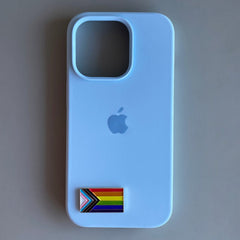 Pinkgul.no LGBTQ pride flag metal sticker applied to a light blue smartphone case