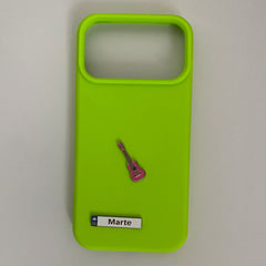 Pinkgul.no lime green phone case featuring a small pink guitar metal sticker and a personalized Marte name plate