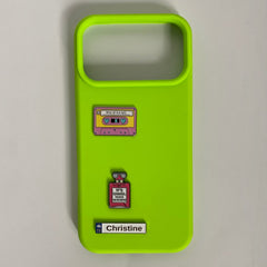 Pinkgul.no lime green phone case decorated with metallic cassette, perfume bottle, and Christine name stickers.
