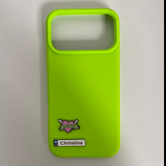 Pinkgul.no bright lime green phone case featuring a decorative metal heart sticker and a personalized Christina name tag