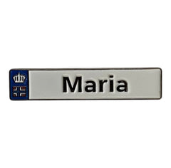 Pinkgul.no Maria decorative metal sticker with a white background, black text, and a small blue crown emblem.