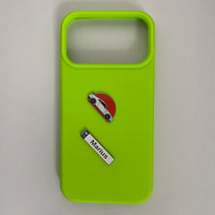 Pinkgul.no decorative metal stickers featuring a car and the name Marius applied to a bright lime green phone case.