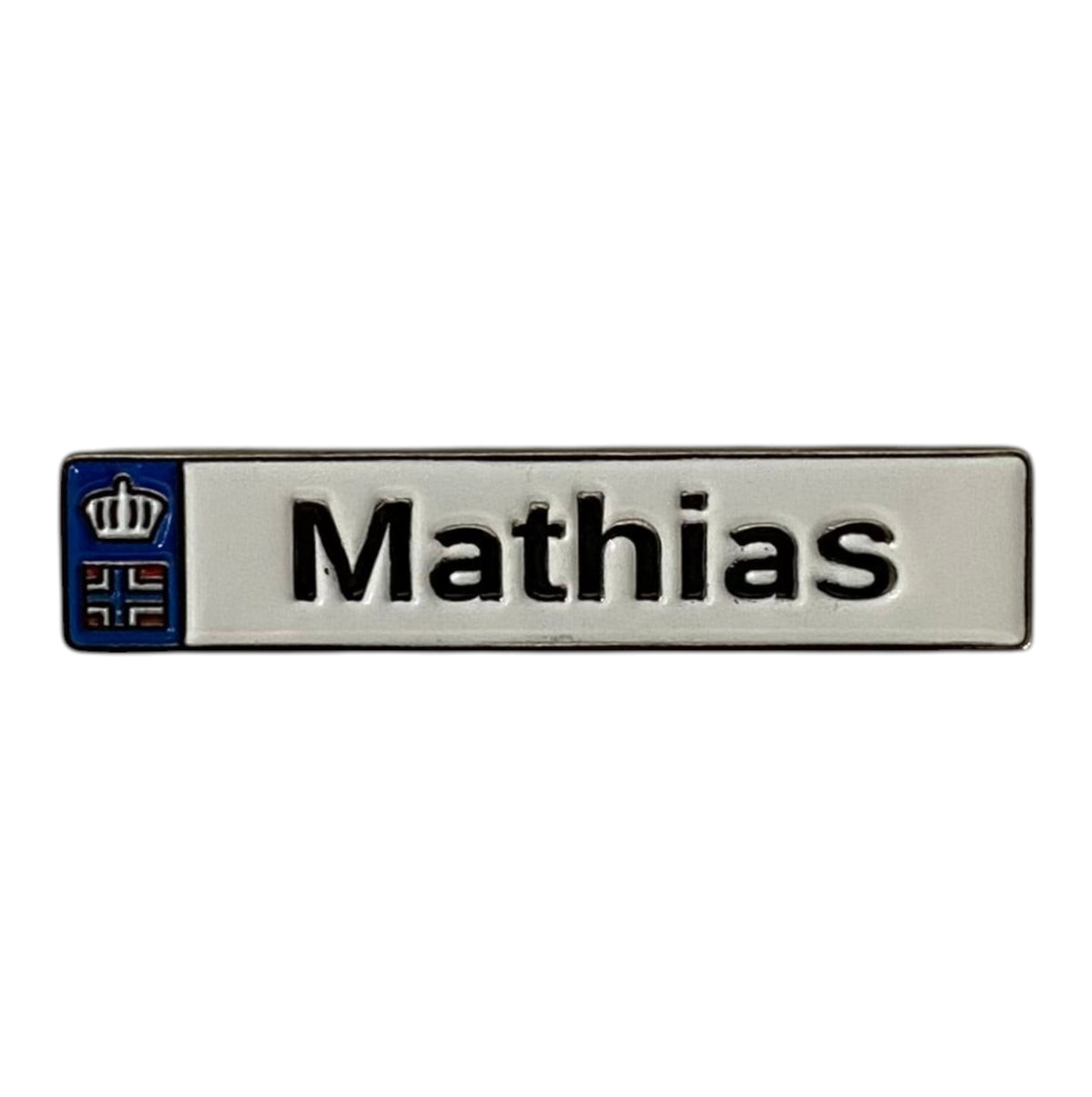 Pinkgul.no Mathias decorative metal sticker with a silver finish, blue crown emblem, and strong adhesive backing.