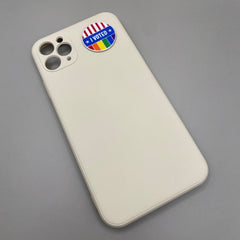 Pinkgul.no decorative metal I Voted sticker with American flag and rainbow design on a beige smartphone case