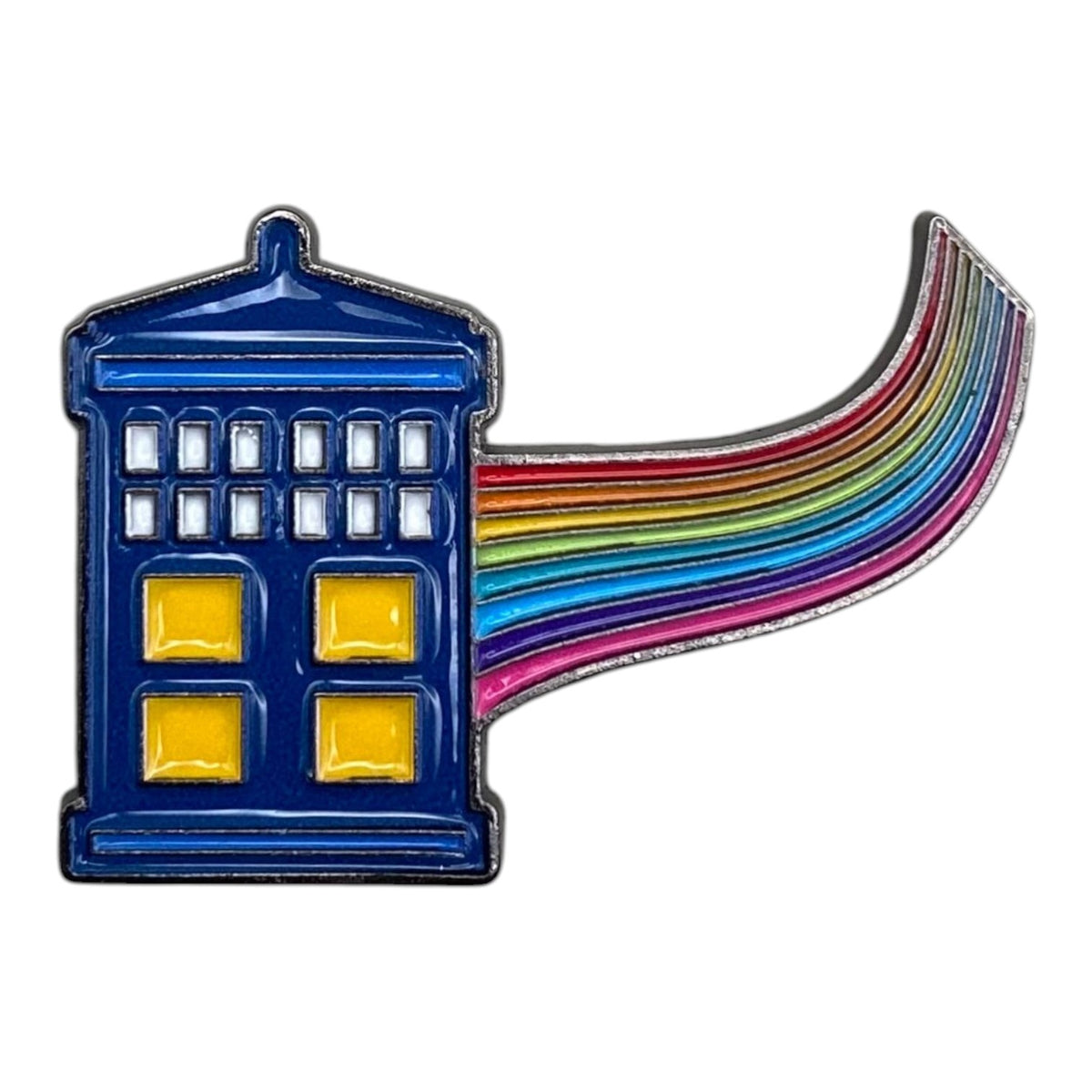 Pinkgul.no decorative metal sticker featuring a blue police box with a rainbow trail on a neutral background