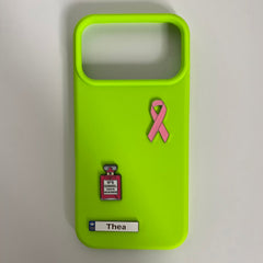 Pinkgul.no neon green phone case decorated with a pink ribbon, perfume bottle, and a custom Thea metal sticker