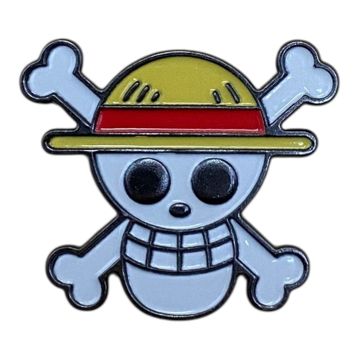 Pinkgul.no decorative metal sticker featuring the One Piece skull and crossbones emblem with a yellow straw hat.