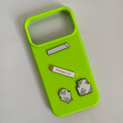 Pinkgul.no Oskar decorative metal stickers with adhesive backing displayed on a bright neon green phone case