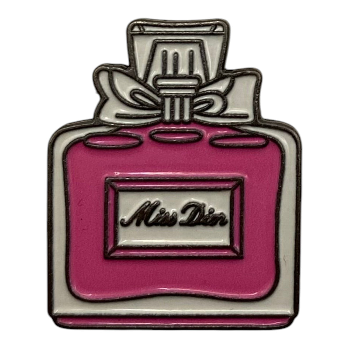 Pinkgul.no decorative metal sticker shaped like a pink and white perfume bottle with a bow and Miss Dior text