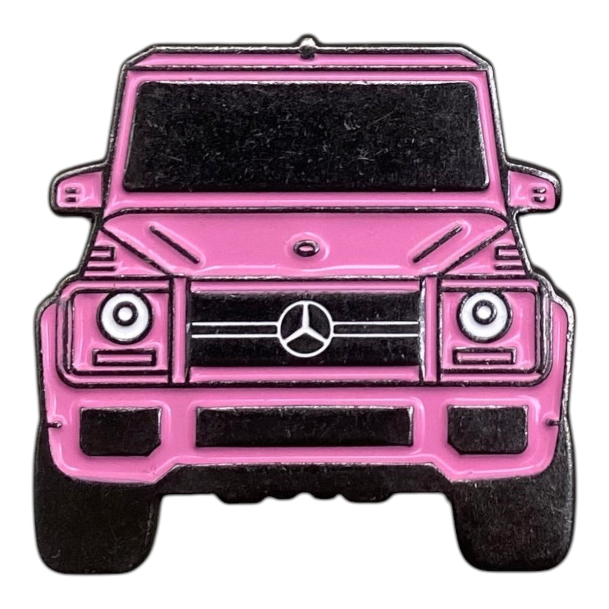 Pinkgul.no enamel pin featuring a pink G-Wagon SUV front view with black detailing and a metallic finish.