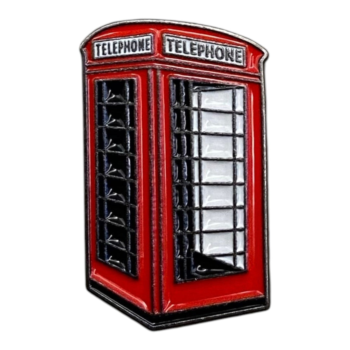 Pinkgul.no decorative metal sticker featuring a detailed red British telephone booth design on a smooth surface.
