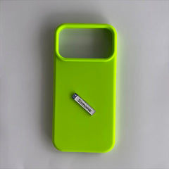 Pinkgul.no Simone decorative metal sticker with raised design applied to a bright lime green phone case
