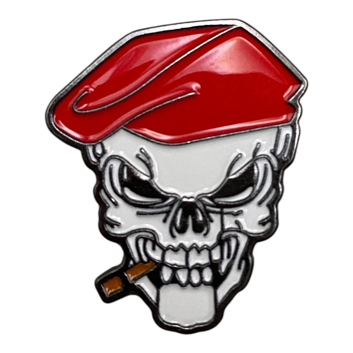 Pinkgul.no decorative metal sticker featuring a skull wearing a red beret and smoking a cigar