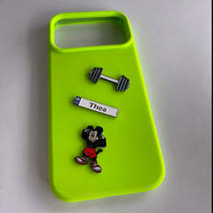 Pinkgul.no Thea decorative metal sticker on a neon green phone case with dumbbell and Mickey Mouse stickers