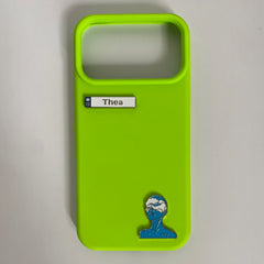 Pinkgul.no Thea decorative metal sticker featuring a blue figure design applied to a bright neon green phone case