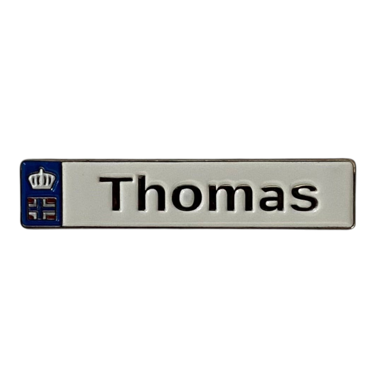 Pinkgul.no Thomas decorative metal sticker with a raised silver finish, blue crown icon, and strong adhesive backing.