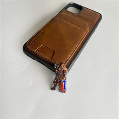 Pinkgul.no Vindra decorative metal sticker featuring a Viking warrior with an axe and Norwegian flag on a phone case